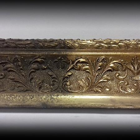 Cleaning of a gilded frame.