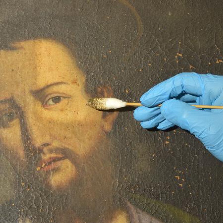 Cleaning of an oil on canvas painting.